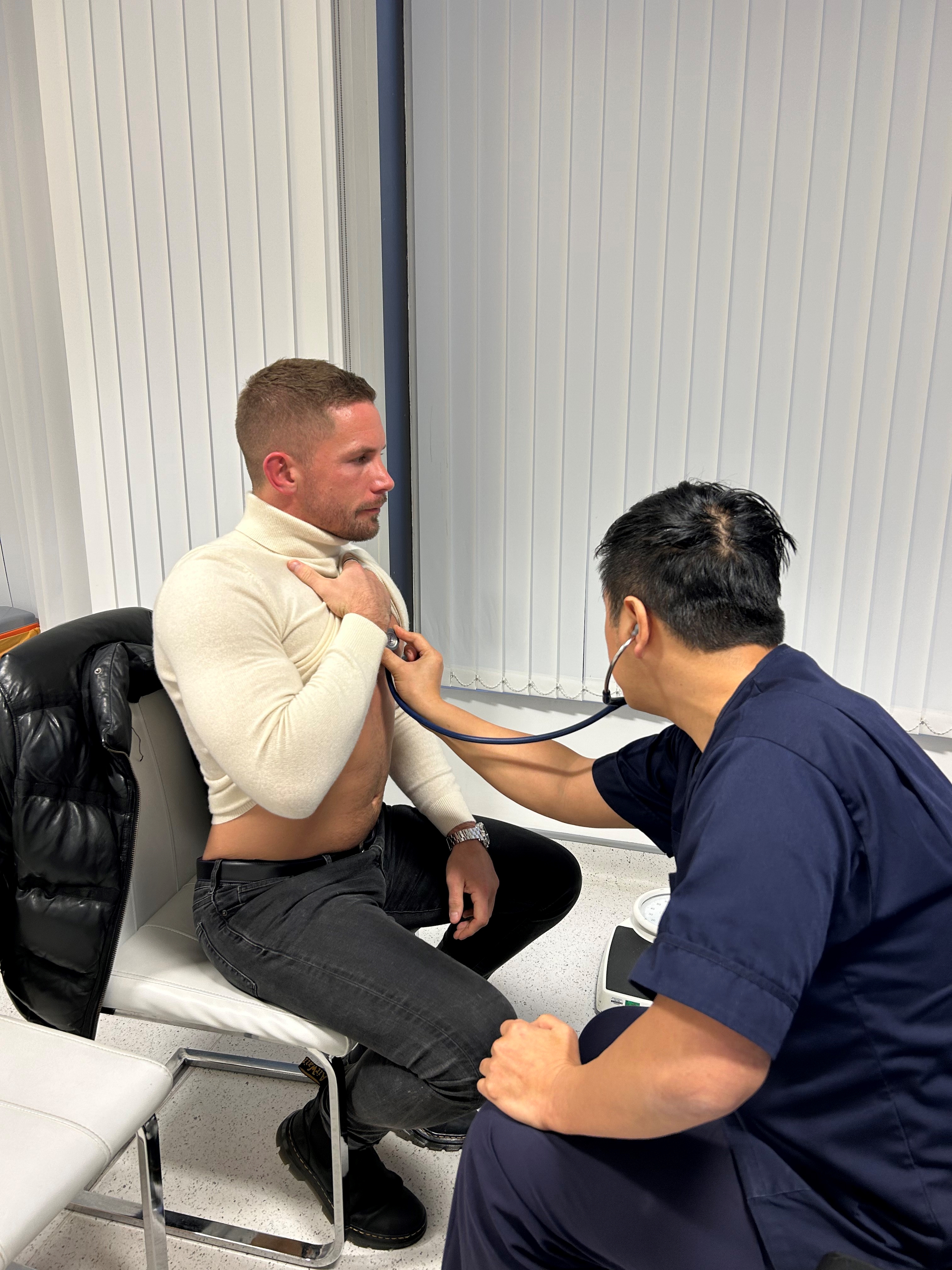 Patient undergoing an ultimate health screen with Dr Tang Patient undergoing an ultimate health screen with Dr Tang